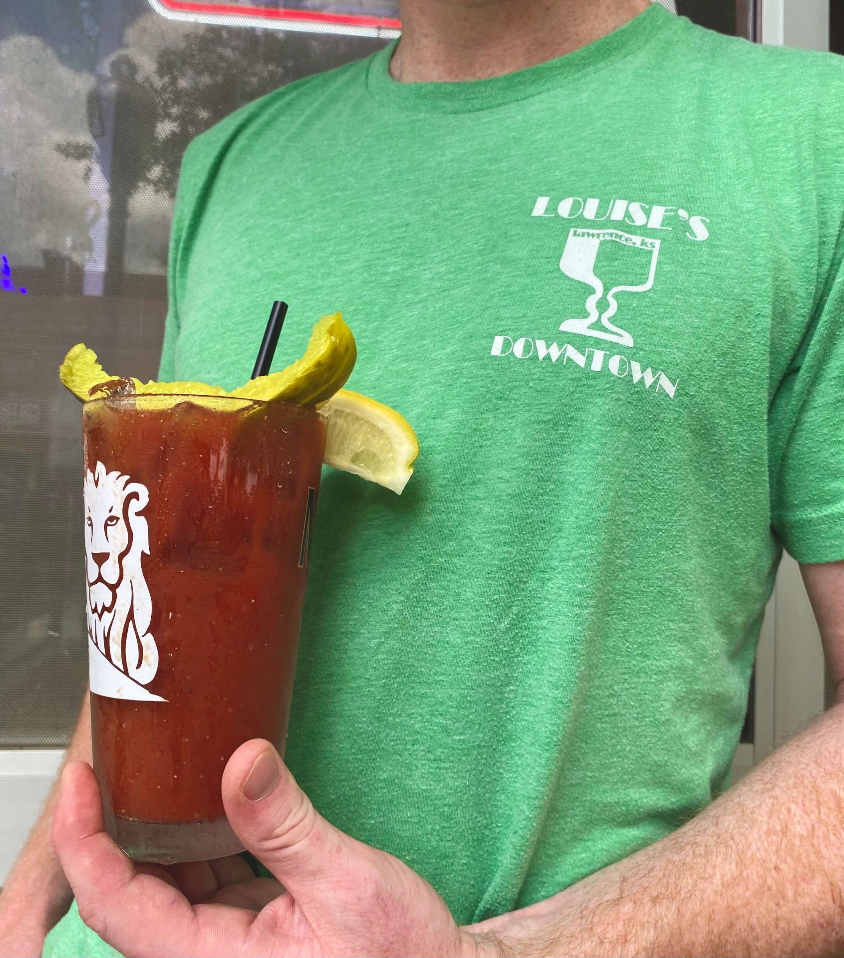 Bloody mary with Louise's Downtown branded glass — Lawrence KS bar