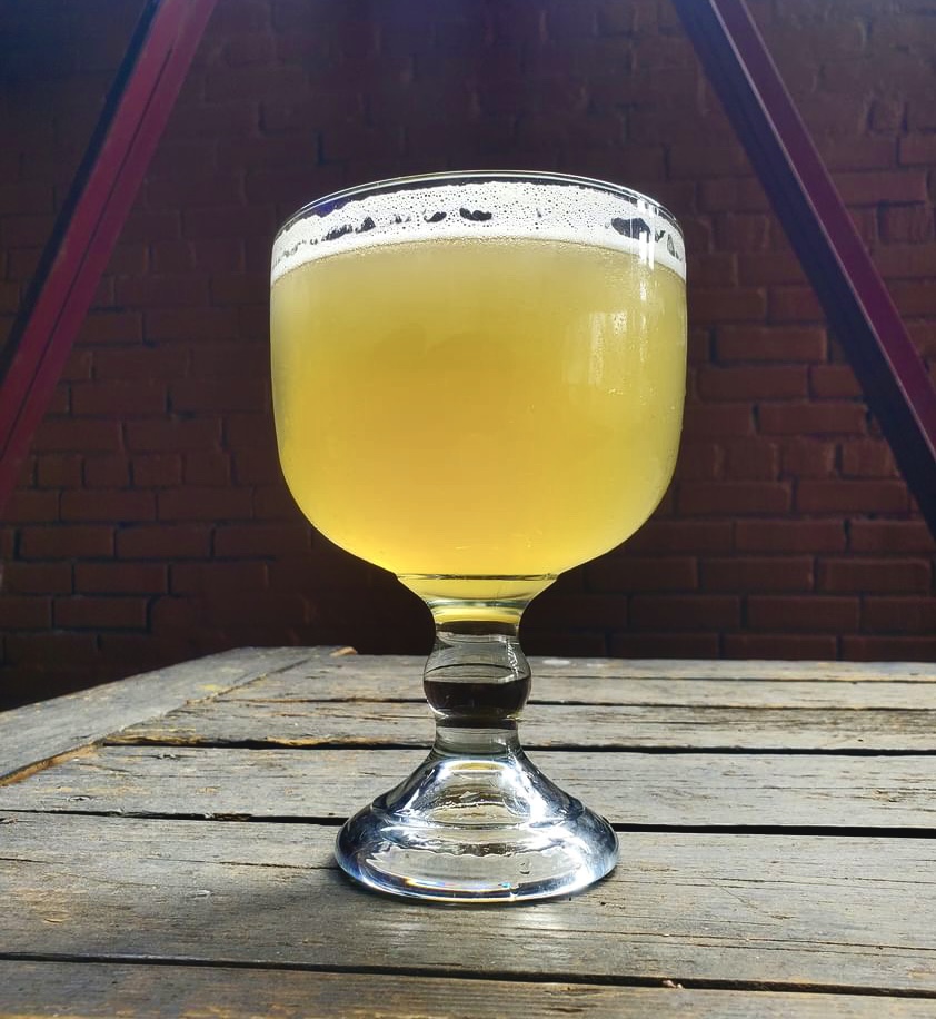 Schooner of beer on the patio at Louise's Bar Downtown Lawrence Kansas